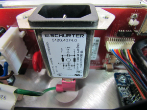 IEC320 power connector with integrated filter